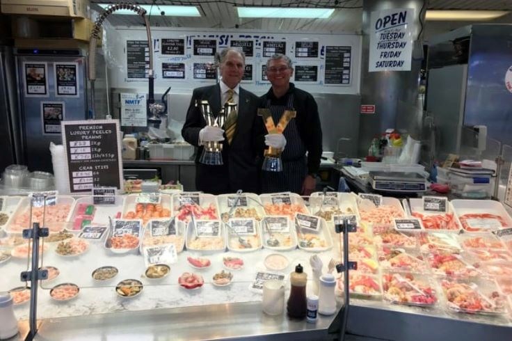 Fish stall holders with the TDY trophy